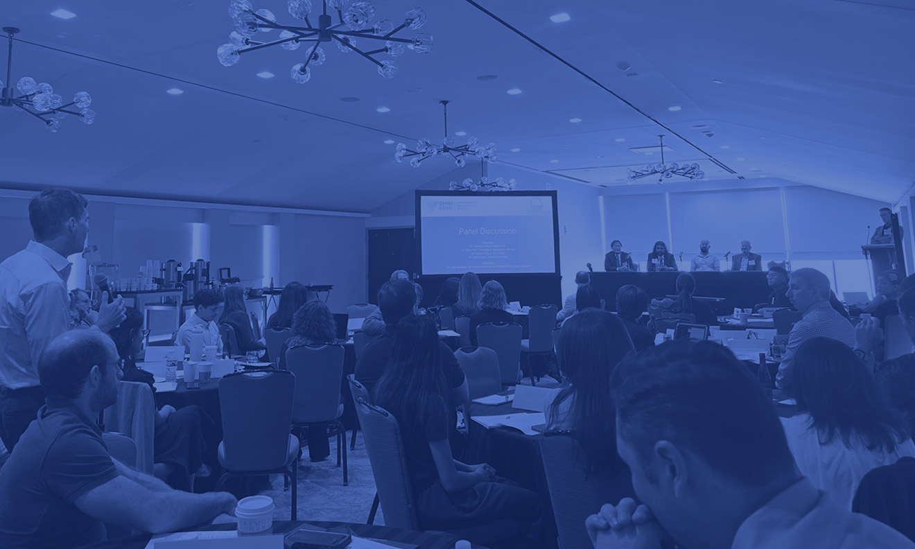 A tinted blue image of a panel discussion held during the June 2026 OMNI ADRD conference.